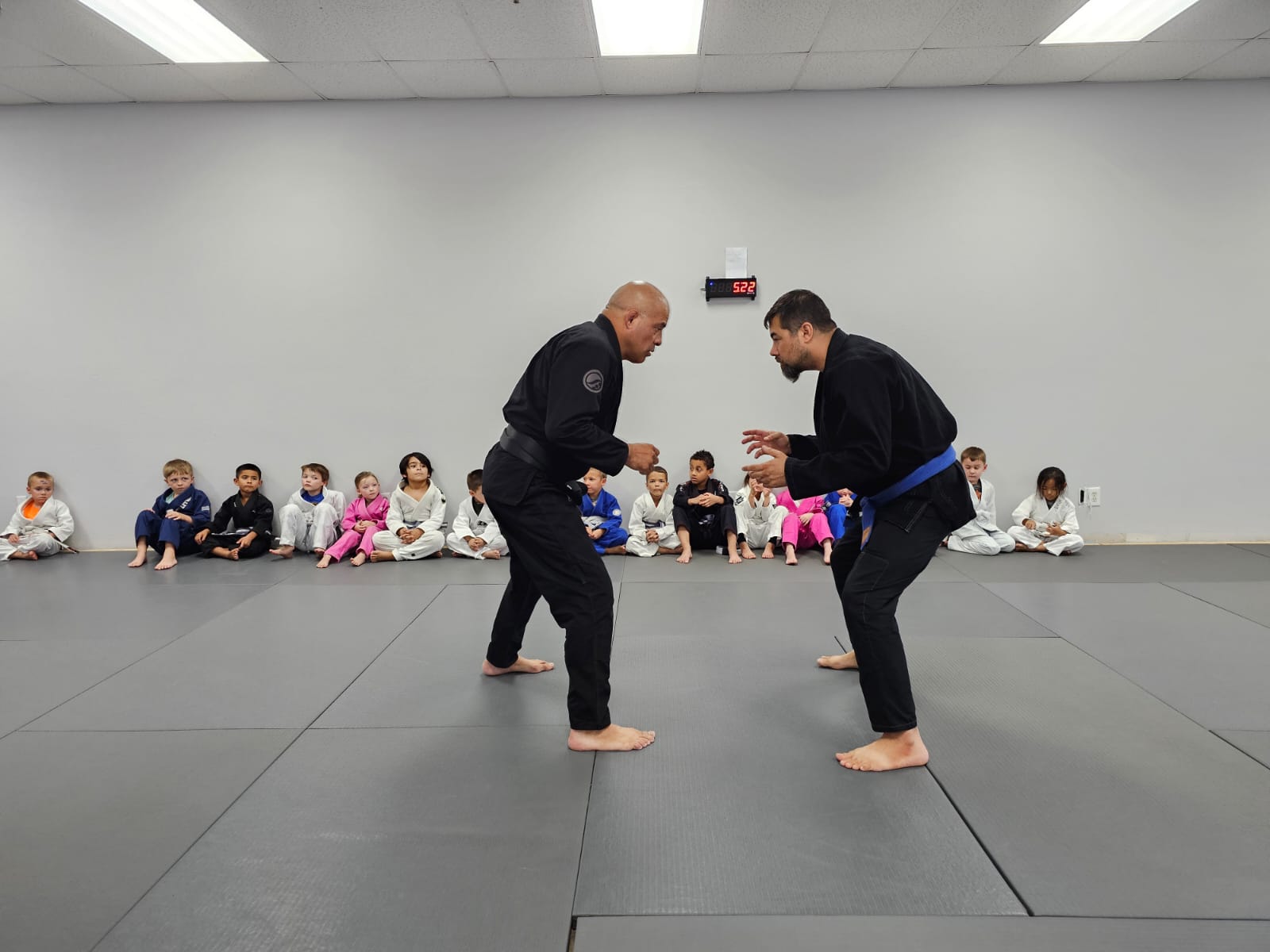 Coaches sparring during class Ares Arizona BJJ